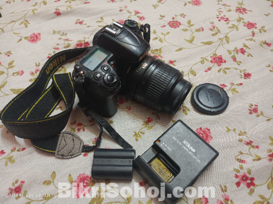 Nikon d7000 bodey lench and battery charger ,bag